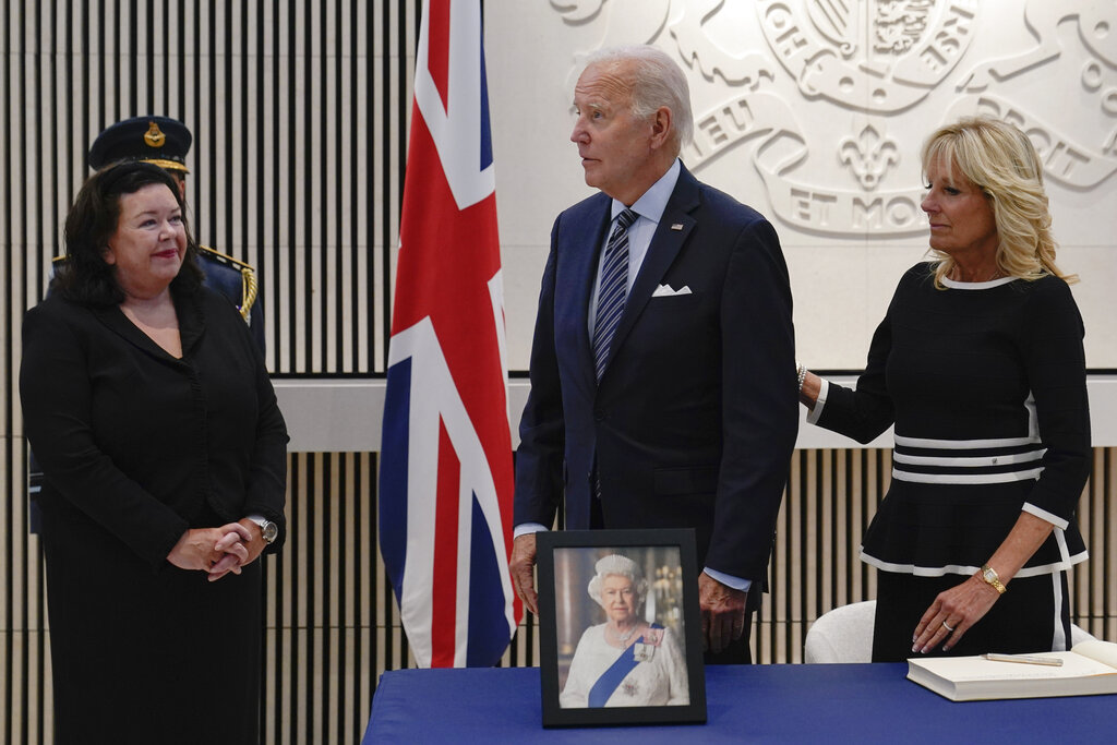 Biden makes surprise visit in honor of late queen