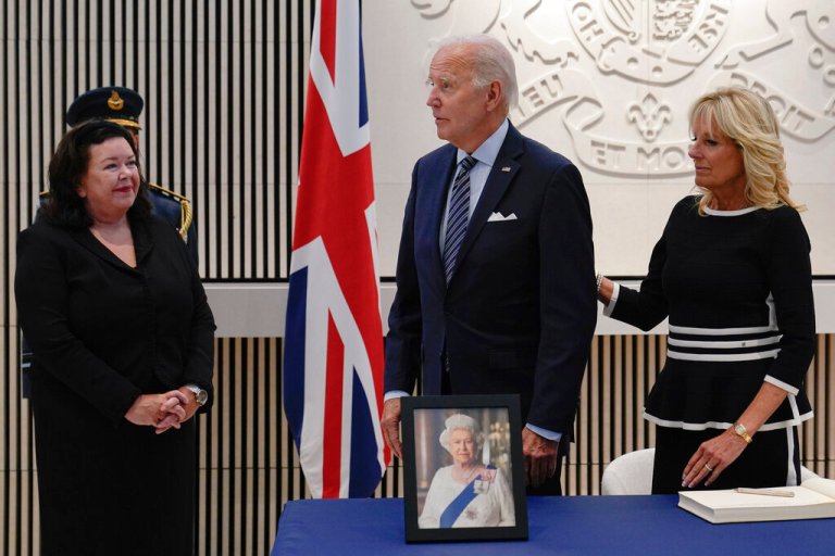 Biden makes surprise visit in honor of late queen