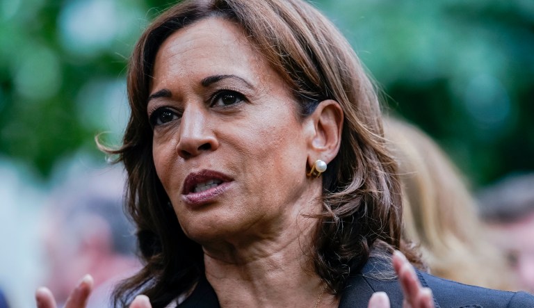 Vice President Kamala Harris speaks to former New York City mayor Michael Bloomberg at the ceremony to commemorate the 21st anniversary of the Sept. 11 terrorist attacks, Sunday, Sept. 11, 2022, at the National September 11 Memorial & Museum in New York.