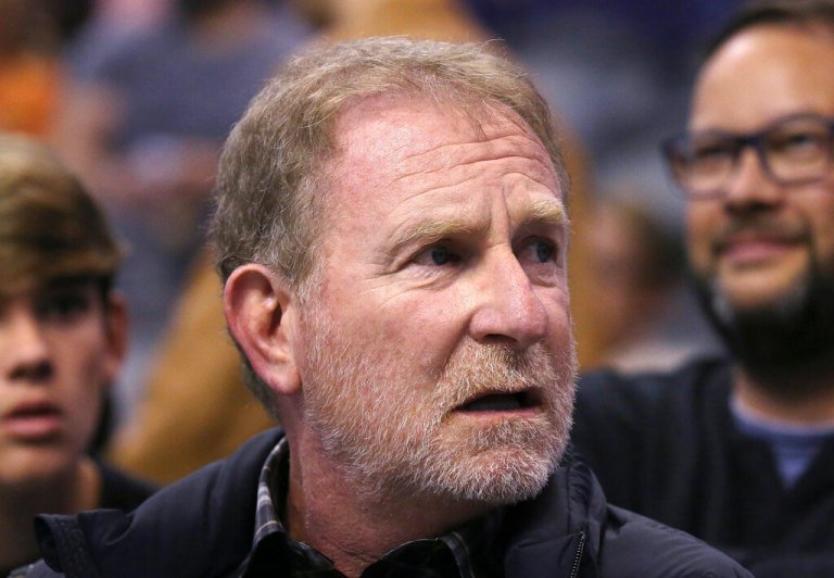 Phoenix Suns owner Robert Sarver watches the team play against the Memphis Grizzlies during the second half of an NBA basketball game in Phoenix.