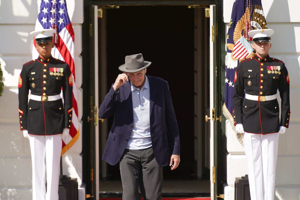 Watch: James Taylor sings of suicide as Dow drops during Biden inflation party