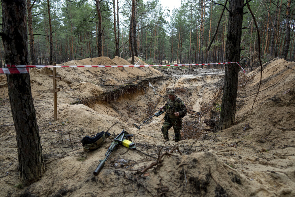 Zelensky says ‘mass burial sites’ found in recently liberated city