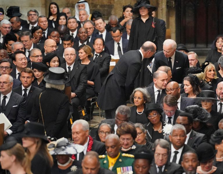US President Joe Biden (right) is seated with his wife Jill Biden next to other global heads of state and dignitaries for the funeral service of Queen Elizabeth II at Westminster Abbey in central London, Monday Sept. 19, 2022. 