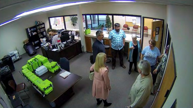 This Jan. 7, 2021, image taken from Coffee County, Georgia, security video appears to show members of a computer forensic team.