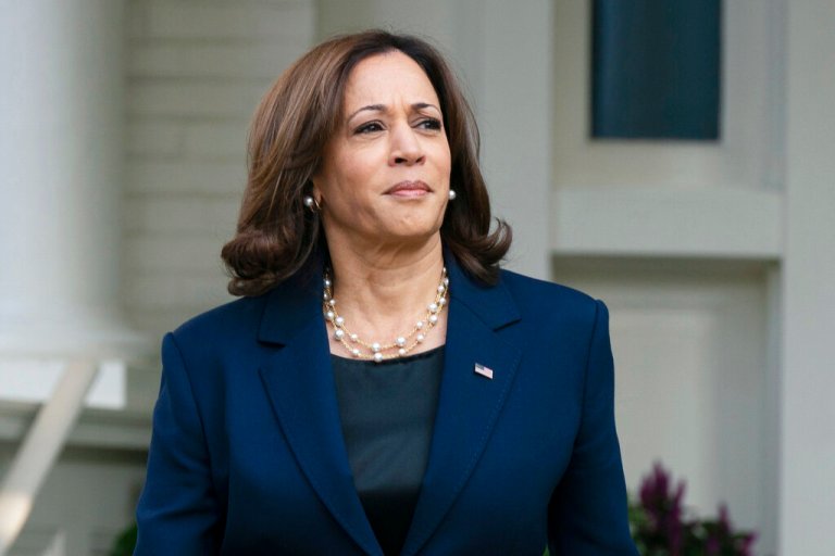 FILE - Vice President Kamala Harris waits outside the Vice President's Sept. 16, 2022, in Washington. Harris is leading a U.S. delegation to Tokyo for the funeral of former Japanese prime minister Shinzo Abe, who was assassinated in July. 