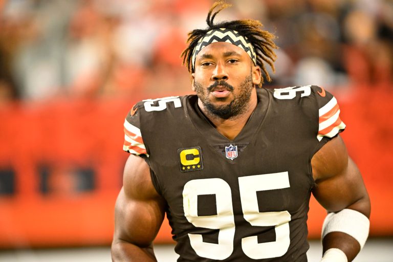 Cleveland Browns defensive end Myles Garrett (95) runs on the field during an NFL football game against the Pittsburgh Steelers, Thursday, Sept. 22, 2022, in Cleveland. The Browns announced Tuesday that the Garrett sustained a shoulder sprain, biceps strain, minor lacerations as well as some bumps and bruises to various other body parts after a car accident he was in on Monday. (AP Photo/David Richard)