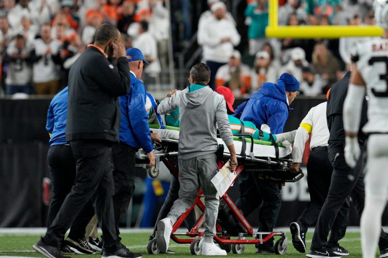Miami Dolphins quarterback Tua Tagovailoa is taken off the field on a stretcher during the first half of an NFL football game against the Cincinnati Bengals, Thursday, Sept. 29, 2022, in Cincinnati.