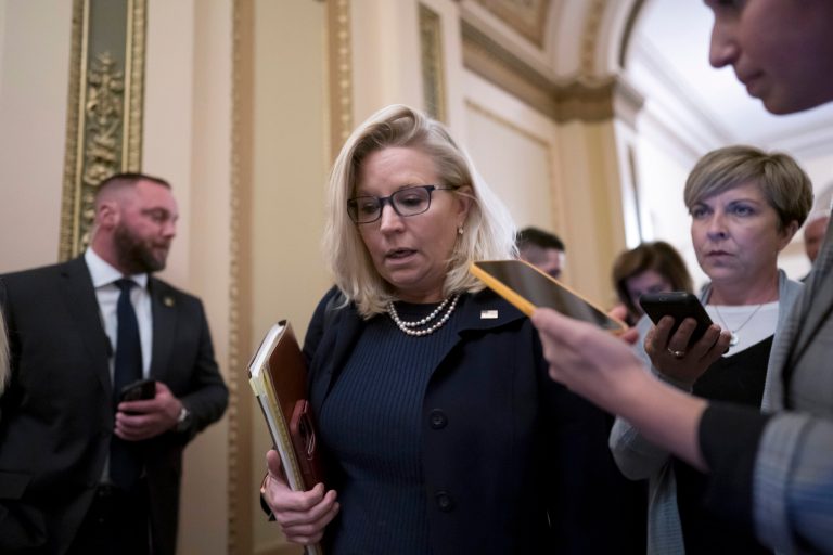 Rep. Liz Cheney (R-WY), the vice chairwoman of the House committee investigating the Jan. 6 attack on the Capitol, speaks with reporters as she walks to the House chamber during final votes at the Capitol in Washington, Friday, Sept. 30, 2022. Cheney has received praise for criticizing former President Donald Trump. 