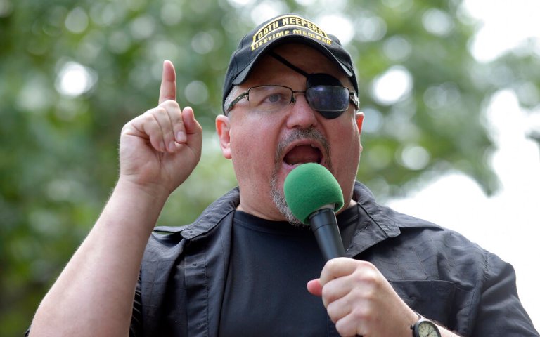 FILE - Stewart Rhodes, founder of the Oath Keepers, speaks during a rally outside the White House in Washington, June 25, 2017. In his trial in the violent Jan. 6, 2021 attack on the U.S. Capitol, attorneys for the leader of the Oath Keepers extremist group will mount an unusual defense with former President Donald Trump at its center. Defense attorneys are poised to argue that Rhodes canât be found guilty of seditious conspiracy because everything he did was in preparation for orders he anticipated coming down from the Republican president. 