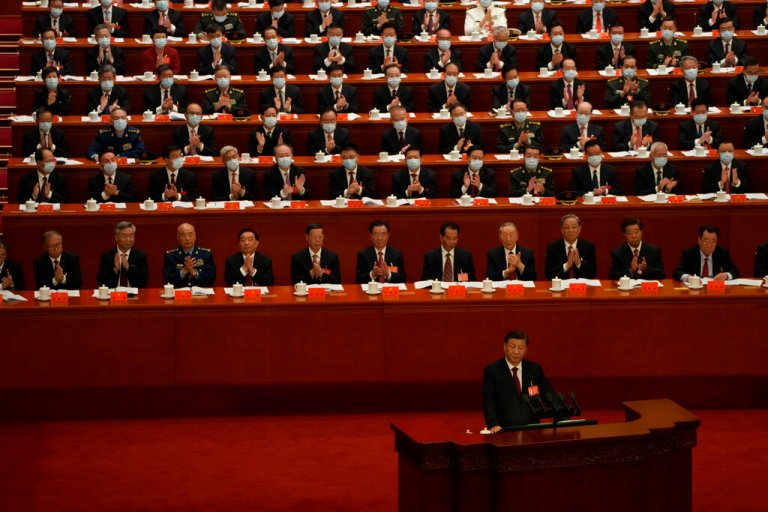 Delegates applaud as Chinese President Xi Jinping speaks during the opening ceremony of the 20th National Congress of China's ruling Communist Party held at the Great Hall of the People in Beijing, China, Sunday, Oct. 16, 2022. 