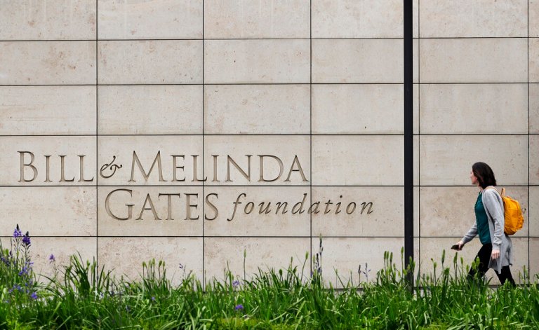 FILE - A person walks by the headquarters of the Bill and Melinda Gates Foundation on April 27, 2018, in Seattle. The Bill and Melinda Gates Foundation announced Sunday, Oct. 16, 2022, that it will commit $1.2 billion to the effort to end polio worldwide.