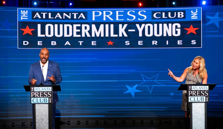 Marjorie Taylor Greene and Democratic challenger spar over Jan. 6 at raucous debate