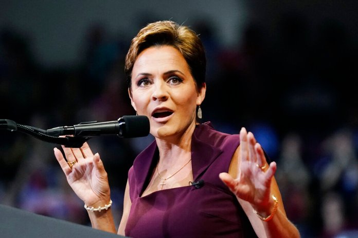 Republican candidate for Arizona governor Kari Lake speaks to supporters prior to former President Donald Trump speaking at a Save America Rally Friday, July 22, 2022, in Prescott, Ariz. 