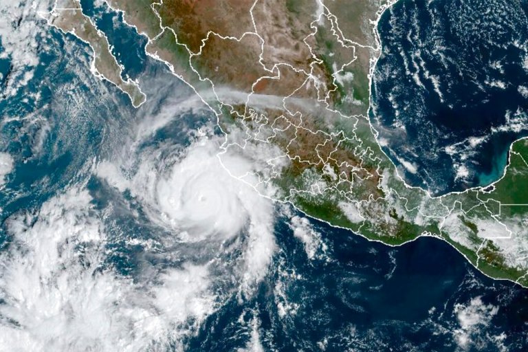 This satellite image taken at 15:30 UTC and provided by NOAA shows Hurricane Roslyn approaching the Pacific coast of Mexico. 