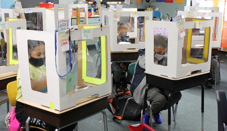 White House tries to distance Democrats from costly school closures