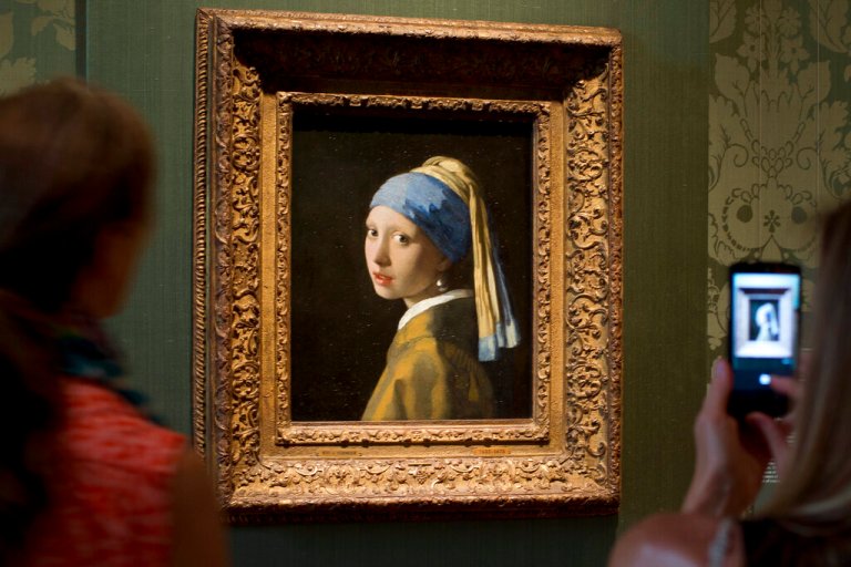 Climate activists dump soup on Vermeer’s Girl with a Pearl Earring