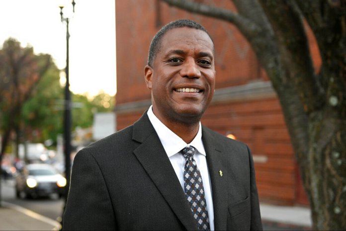 Republican U.S. House candidate George Logan arrives for a debate against U.S. Rep. Jahana Hayes, D-Conn., Tuesday, Oct. 18, 2022, in Waterbury, Conn.