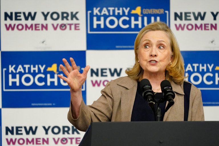 Hillary Clinton returns to campaign trail with midterm warning of ‘far-ranging’ consequences