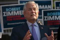 Democrat Robert Zimmerman challenges George Santos to resign and run again in special election