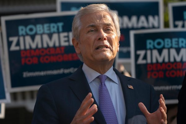 Democrat Robert Zimmerman challenges George Santos to resign and run again in special election