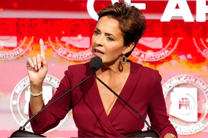Kari Lake, Arizona Republican candidate for governor, speaks to supporters at the Republican watch party in Scottsdale, Ariz., Tuesday, Nov. 8, 2022.
