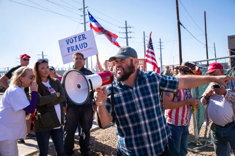 Protesters gather outside of Maricopa County elections office as counting continues