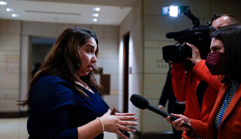 Rep.-elect Delia Ramirez, left, speaks to reporters as newly elected members of the House of Representatives arrived at the Capitol for an orientation program, in Washington, Monday, Nov. 14, 2022. 