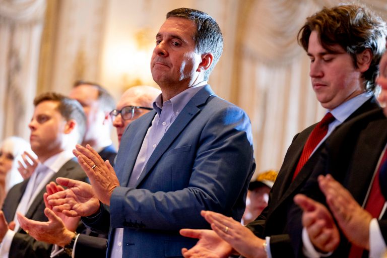 Former Rep. Devin Nunes, R-Calif., applauds in the audience as former President Donald Trump announces he is running for president for the third time as he speaks at Mar-a-Lago in Palm Beach, Fla., Tuesday, Nov. 15, 2022.
