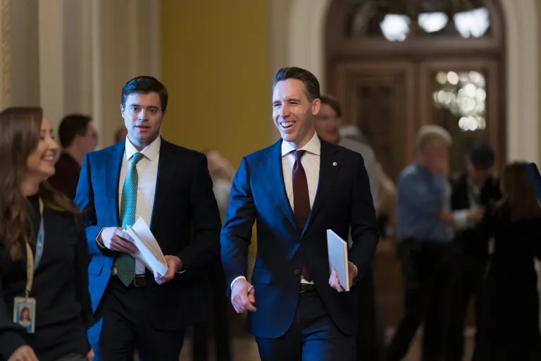 Sen. Josh Hawley, (R-MO), smiles as he arrives to support Sen. Rick Scott, R-FL), in the Senate Republican leadership elections, at the Capitol in Washington, Wednesday, Nov. 16, 2022. (AP Photo/J. Scott Applewhite)
