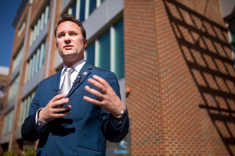 Virginia Attorney General Jason Miyares briefs reporters at Carilion Clinic on March 21, 2022, in Roanoke, Virginia, after meeting with hospital leaders to discuss fighting the opioid epidemic.