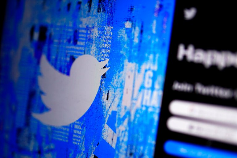 FILE - The Twitter splash page is seen on a digital device, on April 25, 2022, in San Diego. 