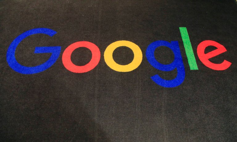 FILE - The logo of Google is displayed on a carpet at the entrance hall of Google France in Paris, on Nov. 18, 2019.  (AP Photo/Michel Euler, File)