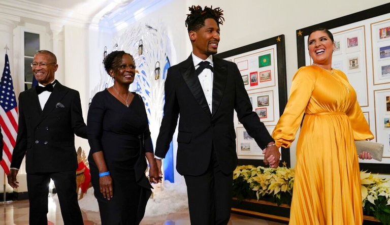 Musician Jon Batiste arrives with his wife Suleika Jaouad and family members 