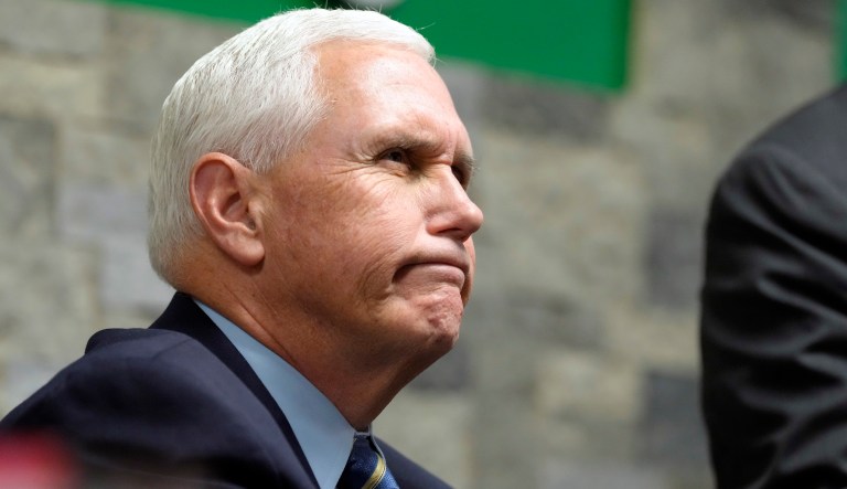 Former Vice President Mike Pence signs copies of his new book after speaking to an audience on Tuesday, Dec. 6, 2022, at Garden Sanctuary Church of God in Rock Hill, S.C.