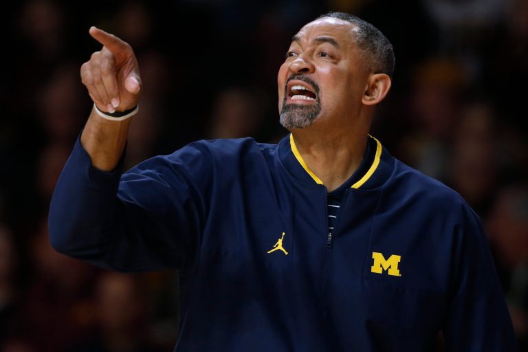 WATCH: Michigan coach Juwan Howard gets restrained and swears at own players during defeat