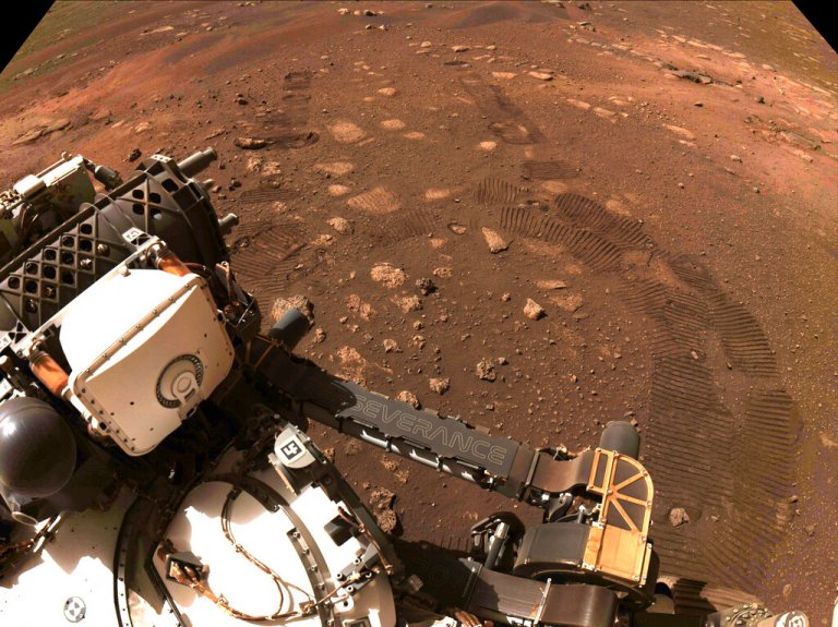 This photo made available by NASA was taken during the first drive of the Perseverance rover on Mars on March 4, 2021. A NASA rover on Mars by chance had its microphone on when a whirling tower of red dust passed overhead and caught the sound. Scientists released the first-of-its-kind audio Tuesday, Dec. 13, 2022. 