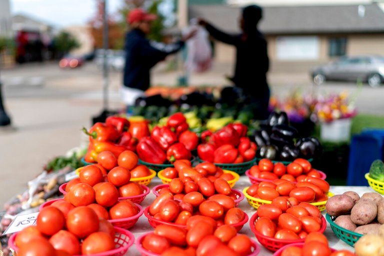 Vegetables for sale are displayed at a farmers market in Baldwin, Wis, Saturday, Oct. 1, 2022. 