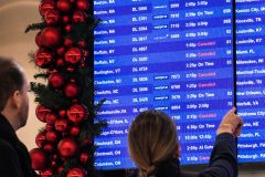 Canceled and delayed flights near 30,000 amid rare bomb cyclone