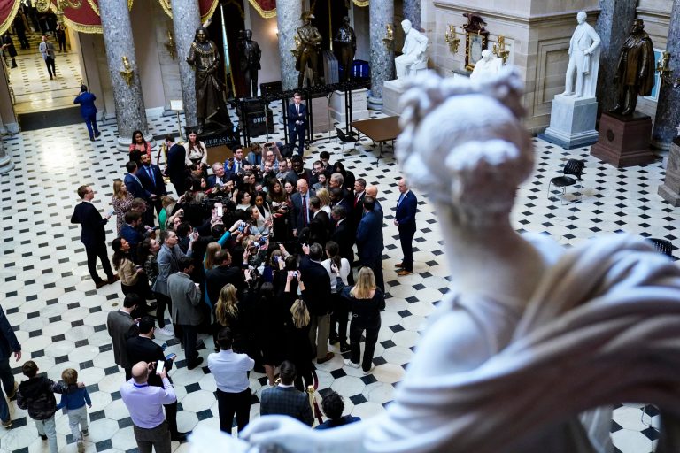 Members of the conservative freedom caucus, talk to reporters in Statuary Hall at the Capitol in Washington, Friday, Jan. 6, 2023. 
