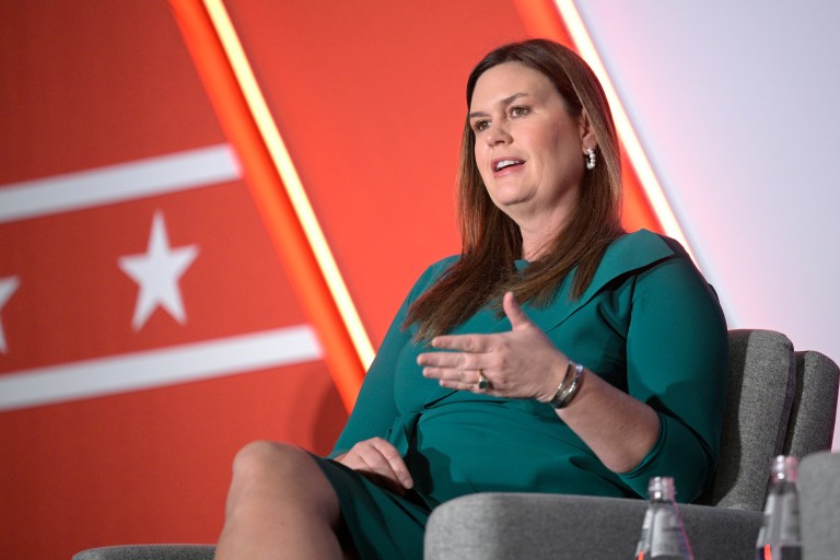 Sarah Huckabee Sanders answers a question while taking part in a panel discussion during a Republican Governors Association conference on Nov. 16, 2022, in Orlando, Florida. 