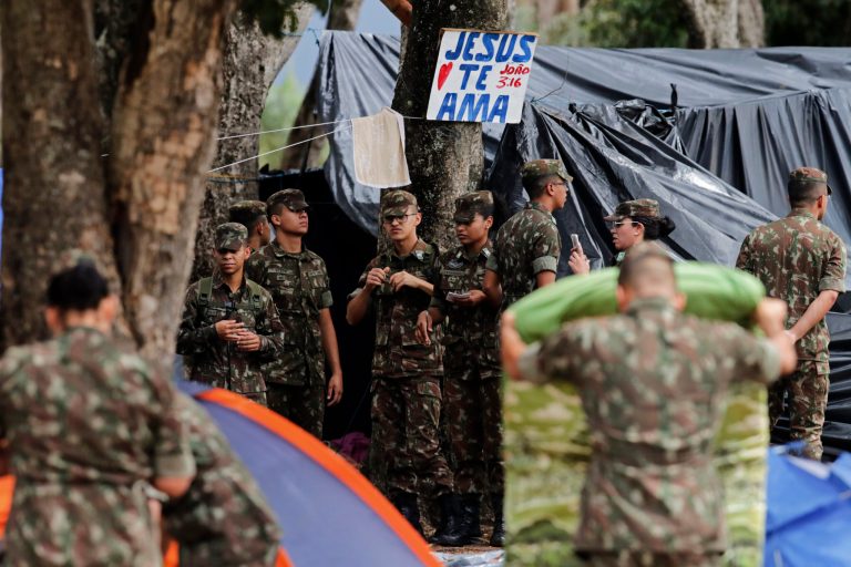 Soldiers clear out an encampment set up by supporters of former Brazilian President Jair Bolsonaro outside army headquarters.