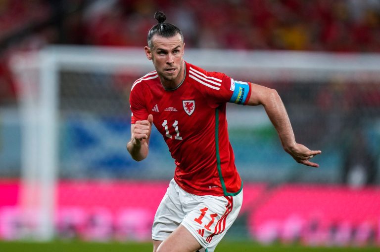 Wales's Gareth Bale runs during the World Cup group B soccer match between England and Wales, at the Ahmad Bin Ali Stadium in Al Rayyan, Qatar, Tuesday, Nov. 29, 2022.