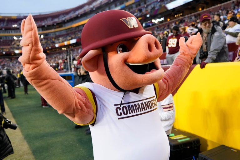 Washington Commanders mascot Major Tuddy walks on the sideline before an NFL football game between the Commanders and the Dallas Cowboys.