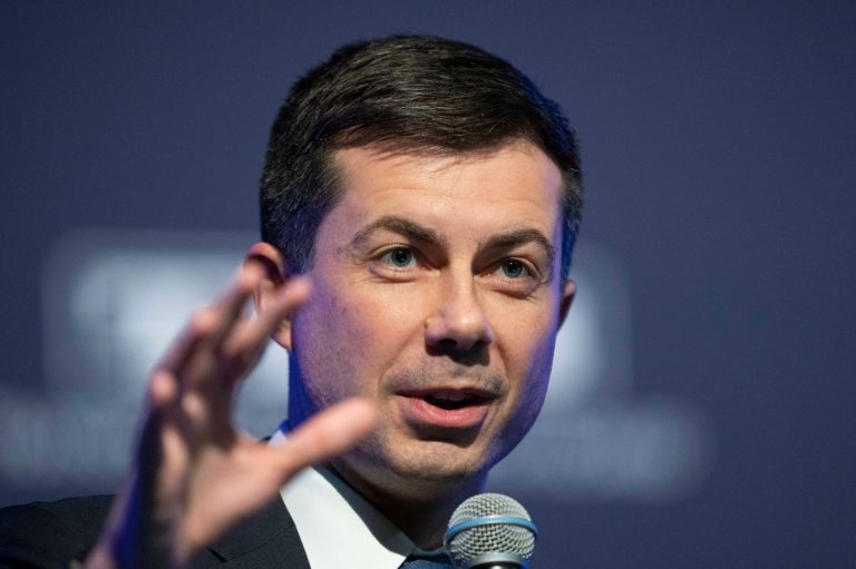 Transportation Secretary Pete Buttigieg, speaks to the Transportation Research Board gathering in Washington, Wednesday, Jan. 11, 2023.