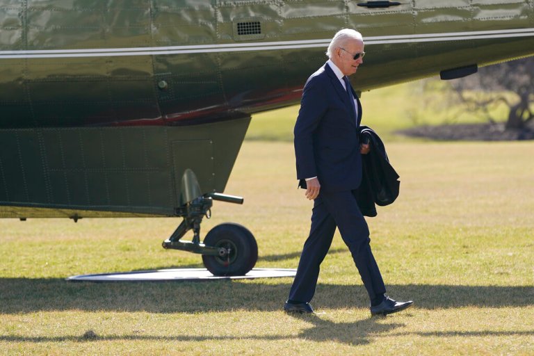 President Joe Biden walks on the South Lawn of the White House after stepping off Marine One, Monday, Jan. 16, 2023, in Washington. Biden is returning to Washington after spending the weekend at his home in Delaware. 