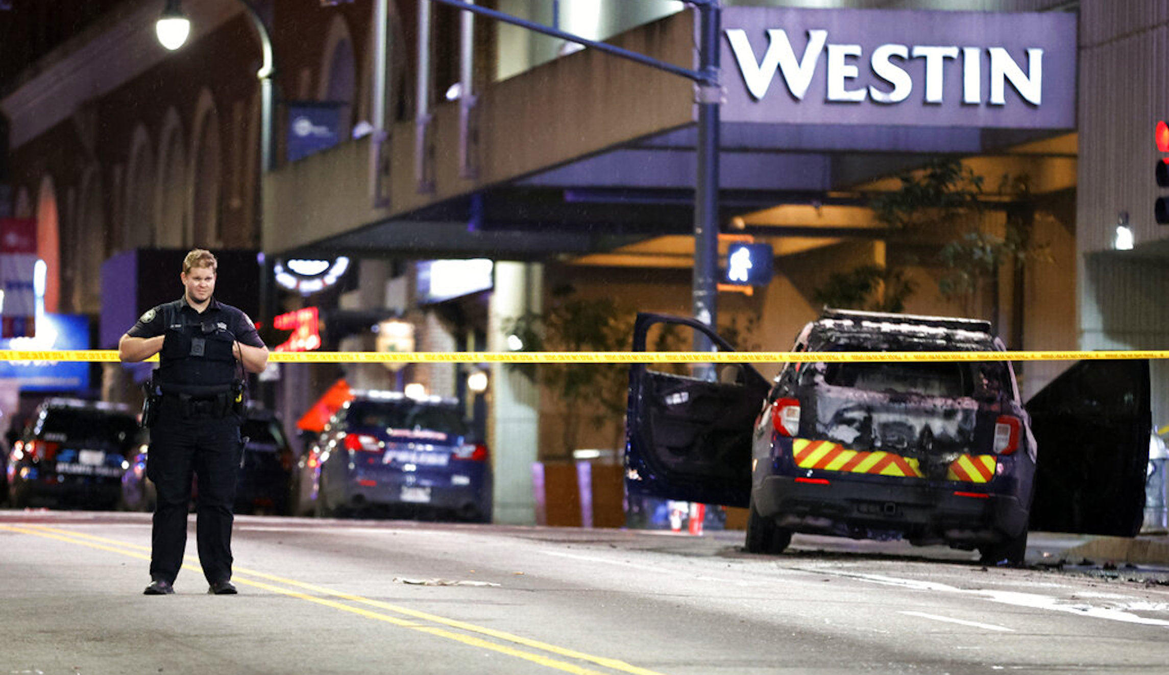 Six arrested after protesters attack businesses, set police car on fire in Atlanta