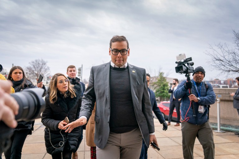 Rep. George Santos, R-N.Y., leaves a House GOP conference meeting on Capitol Hill in Washington, Wednesday, Jan. 25, 2023.