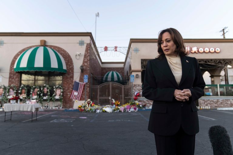Vice President Kamala Harris talks to the media while visiting a memorial set up outside Star Dance Studio in Monterey Park, California.