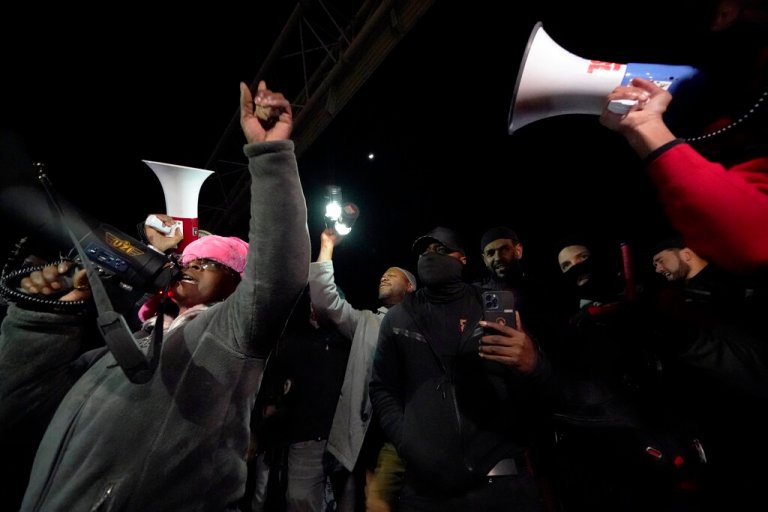 Protesters gather Friday, Jan. 27, 2023, in Memphis, Tennessee, as authorities release police video depicting five Memphis officers beating Tyre Nichols.