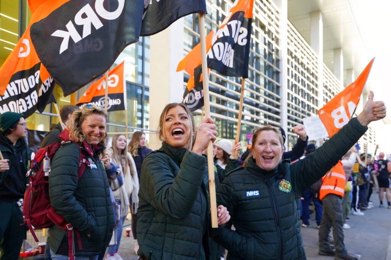 Ambulance staff on the picket line outside Royal Sussex County Hospital, during a strike by nurses and ambulance staff, in Brighton, England, Monday, Feb. 6, 2023. 